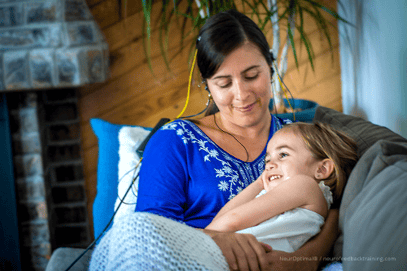 parent-relaxing-with-child-during-a-neuroptimal-neurofeedback-at-home-session