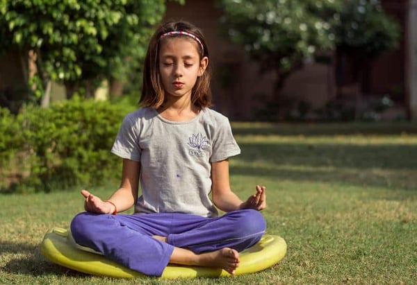 child meditating