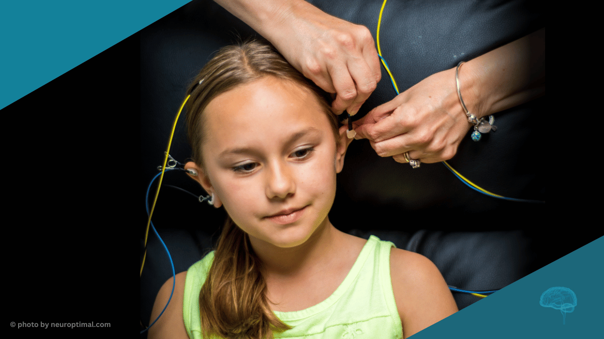 child with eeg sensors using the neuroptimal neurofeedback technology